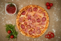 Pizza Quatro Carni 1+1 GRATIS image