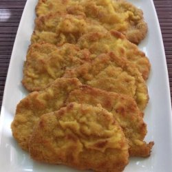 Șnitele de porc aurii image