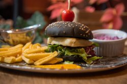 Halloumi burger in black bun image