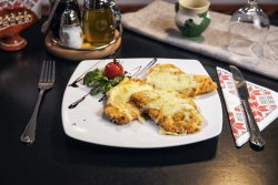 Șnițel gratinat cu cașcaval image