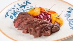 Duck Breast with mushed sweet Potato, Red Berries sauce and baby carrot image