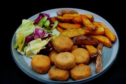 Crispy Chicken Bites with salad and fried potatoes image