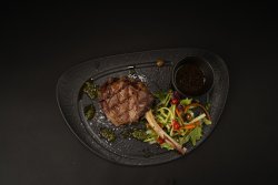 Grilled bone-in veal chop grilled image