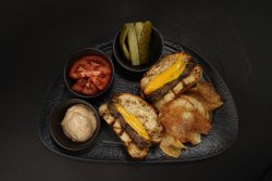 All beef burger & parmesan potato chips image