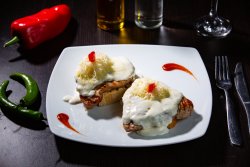 Medalion de porc gratinat cu sos alb image