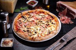Pizza Prosciutto e funghi image