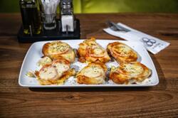 Bruschete cu roșii și mozzarella image