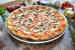 Pizza prociutto e funghi image