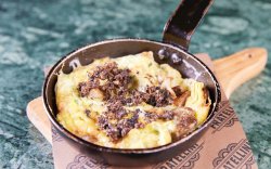 Provencal omelette with porcini mushrooms and fresh grated truffles image
