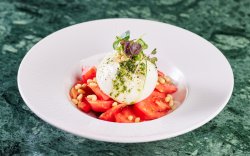 Burrata italiana with Tomatoes and fresh Basil and Olive Oil image