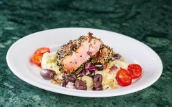 Grilled tuna in a sesame crust with mashed potatoes, olive salsa and truffles image