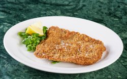 Imperial schnitzel: breaded veal with mix of green salads image