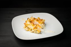Penne integrale gratinate cu brânzeturi și bacon image