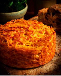 Budincă din spaghetti cu ricotta ,sos de vanilie. image