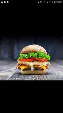 Cheeseburger,,BISMARCK`.....gătit în cuptorul grătar JOSPER la jar...elementul care ne definește....gust, suculență image