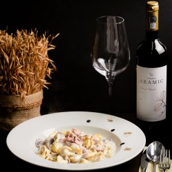 Tortellini panna prosciutto e funghi image