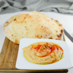 Hummus Home made & sea flakes pita image