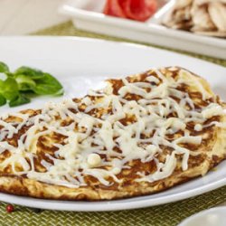 Omletă cu șuncă și cașcaval image