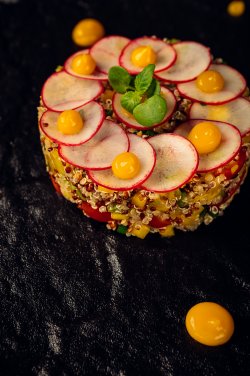 Quinoa salad, apio, cherry tomatoes, mango gel, onion image