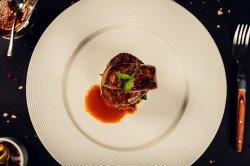 Argentinian beef tenderloin, seared foie gras, truffle & spinach image