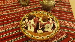 Papanași cu smântână și dulceață/ Donuts with sour cream and jam image