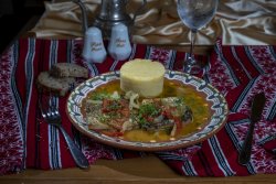 Saramură de crap cu mămăliguță/Carp brine with polenta image