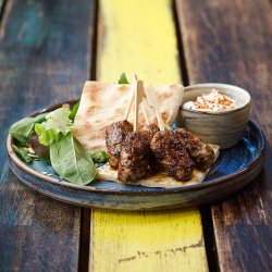 Lamb kofta dusted with spice and served with tzatziki  image