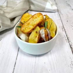 Cartofi la cuptor cu rozmarin și usturoi image