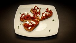 Bruschete cu mozzarella și roșii image