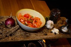 Tomatoes salad with olive oil image