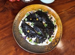 Ravioli nero di sepia cu fructe de mare image
